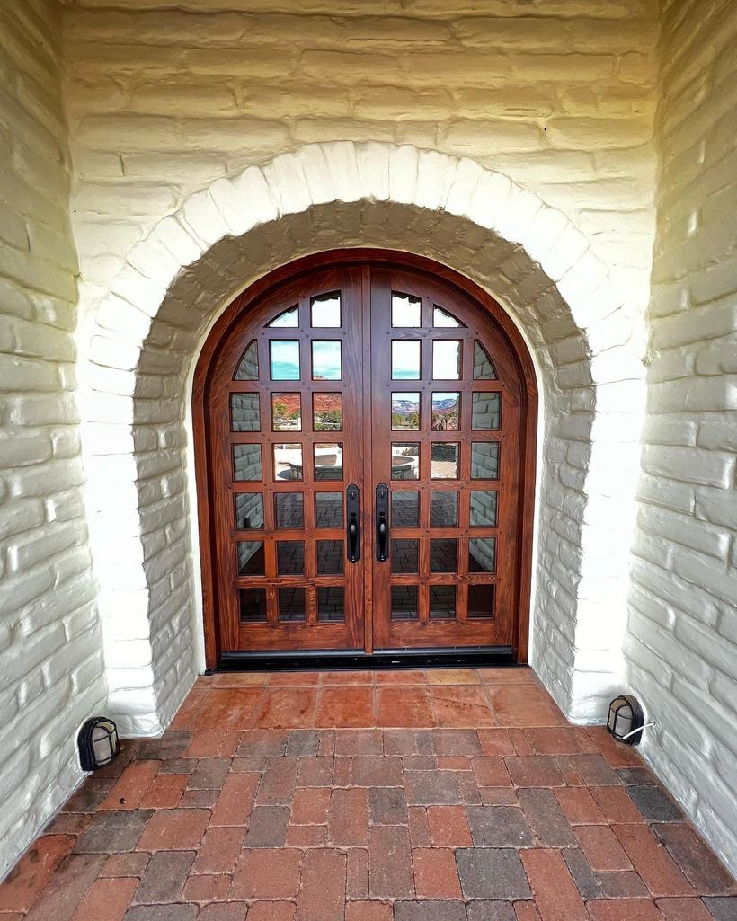 Custom arched wood double entry doors